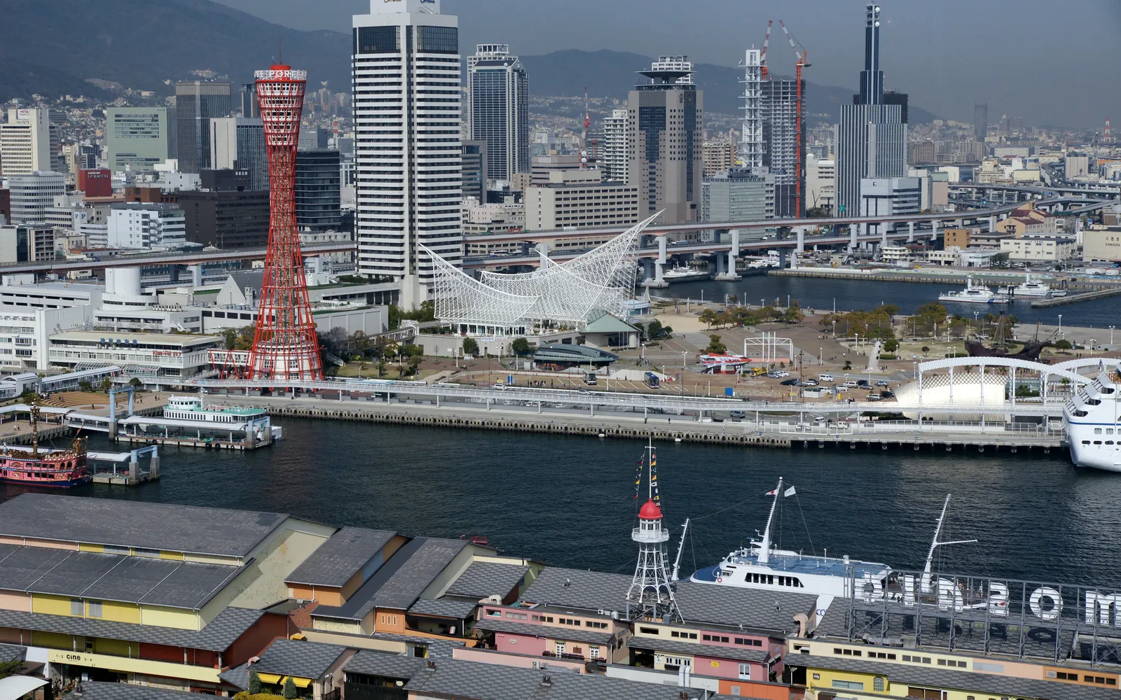 Meriken Park along the Kobe waterfront, with the Port Tower and Maritime Museum as backdrop