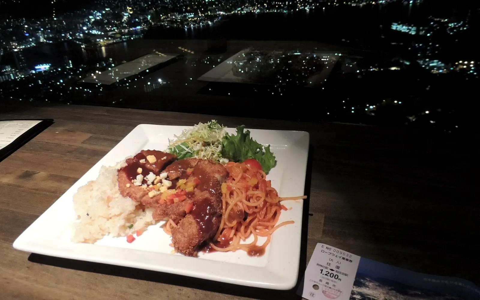 A plate of Nagasaki Toruko Rice — fried rice, tomato-sauce spaghetti, and a breaded pork tonkatsu on one plate