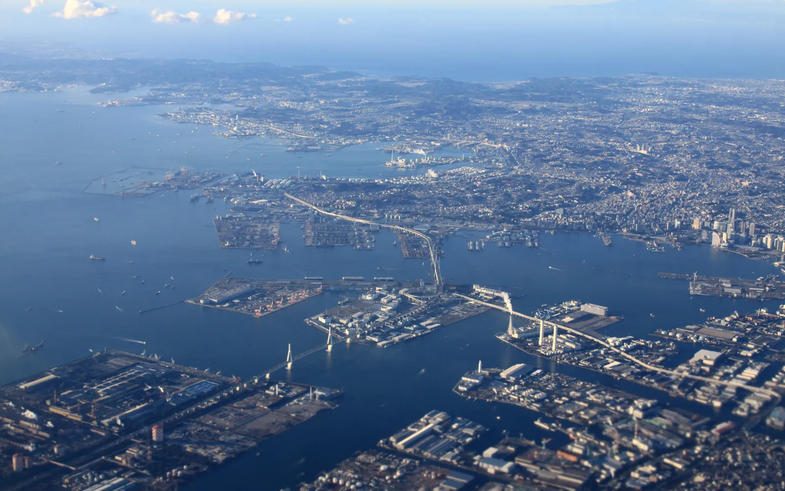 The wave-shaped Osanbashi international pier extending into Yokohama Bay