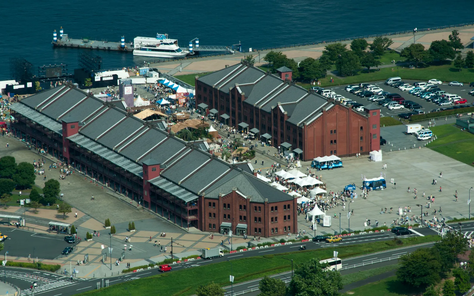 Meiji-era red brick warehouses on the Yokohama waterfront surrounded by parkland