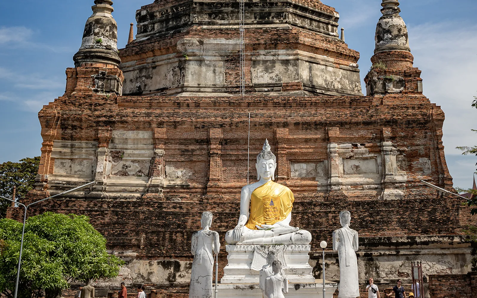 Large bell-shaped chedi and rows of seated Buddha images at Wat Yai Chai Mongkhon, Ayutthaya
