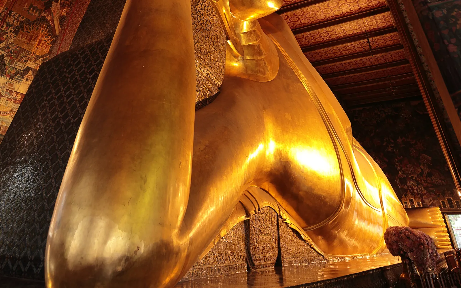 The giant golden Reclining Buddha at Wat Pho in Bangkok, 46 metres long with mother-of-pearl inlaid soles