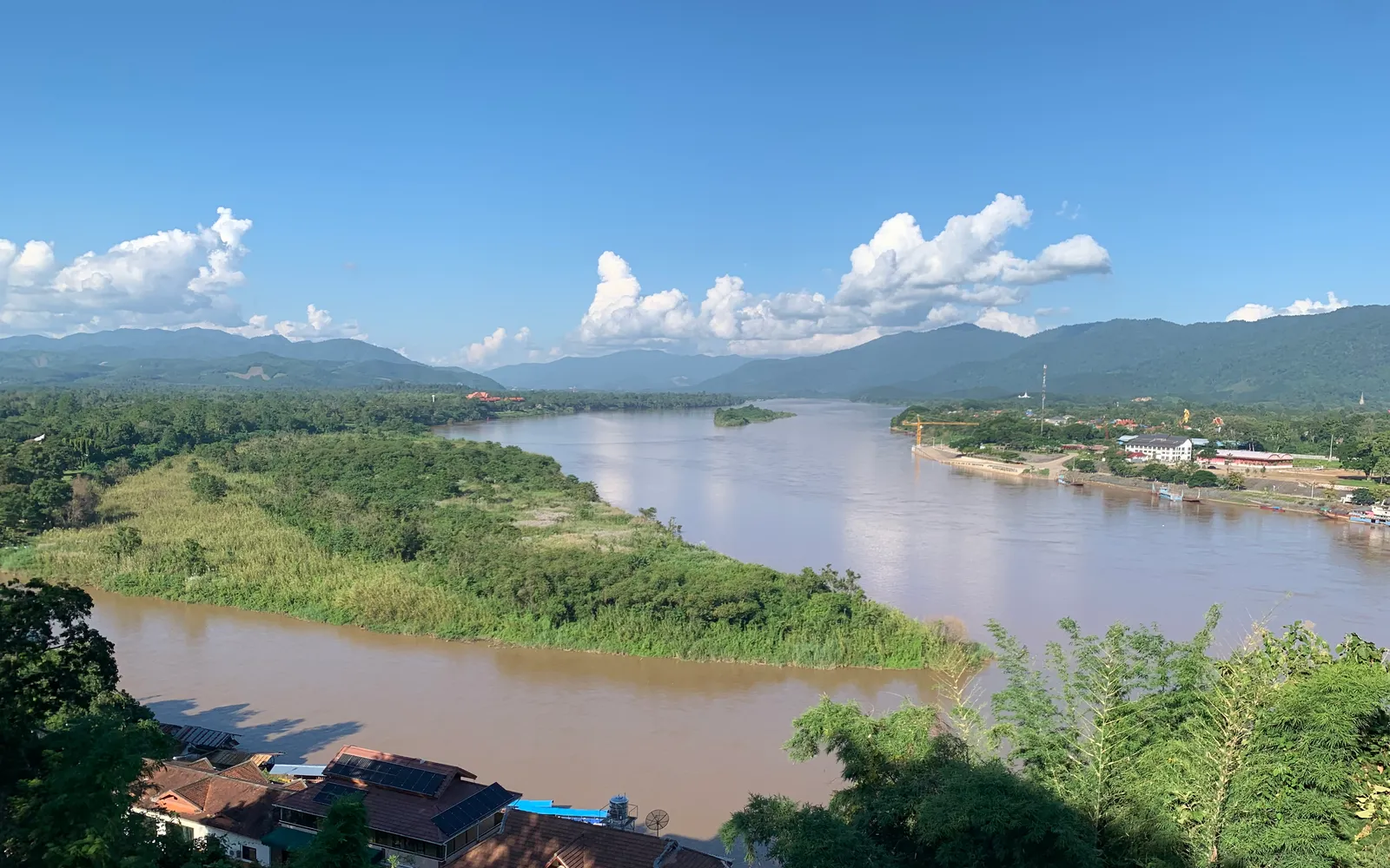 The Golden Triangle confluence on the Mekong — the Ruak River joins the Mekong at the point where Thailand, Laos, and Myanmar meet