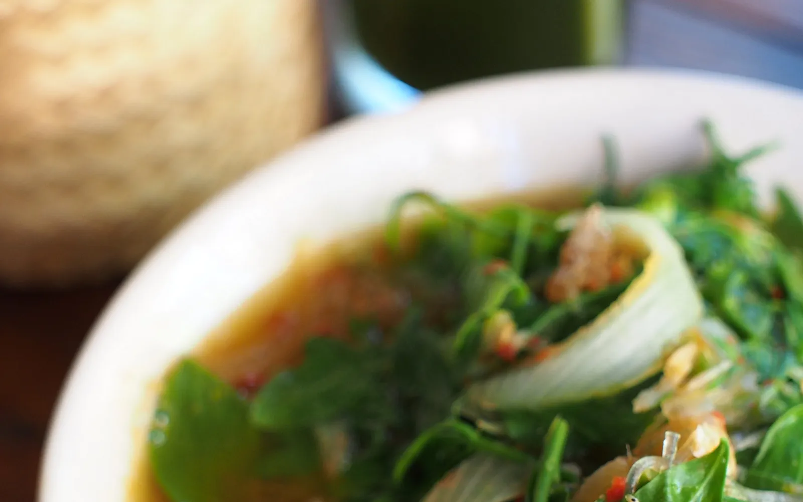 Kaeng Pa — deep-red jungle curry with local vegetables and meat, served in a clay bowl