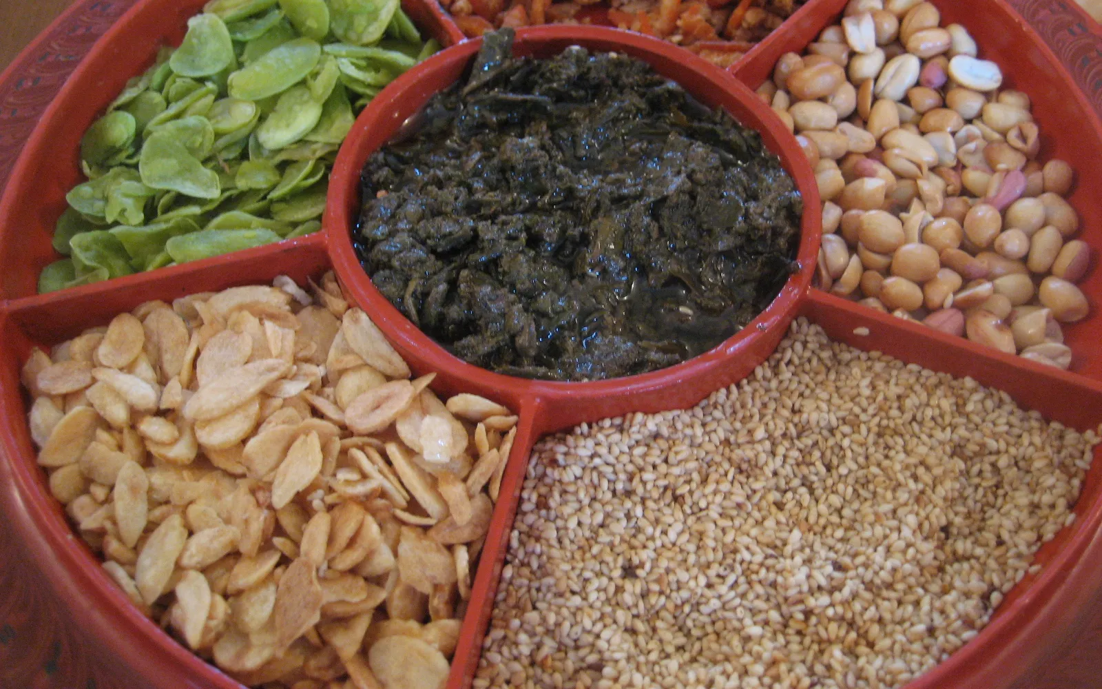 Mon-style curry rice — orange-yellow chicken curry served on a banana leaf