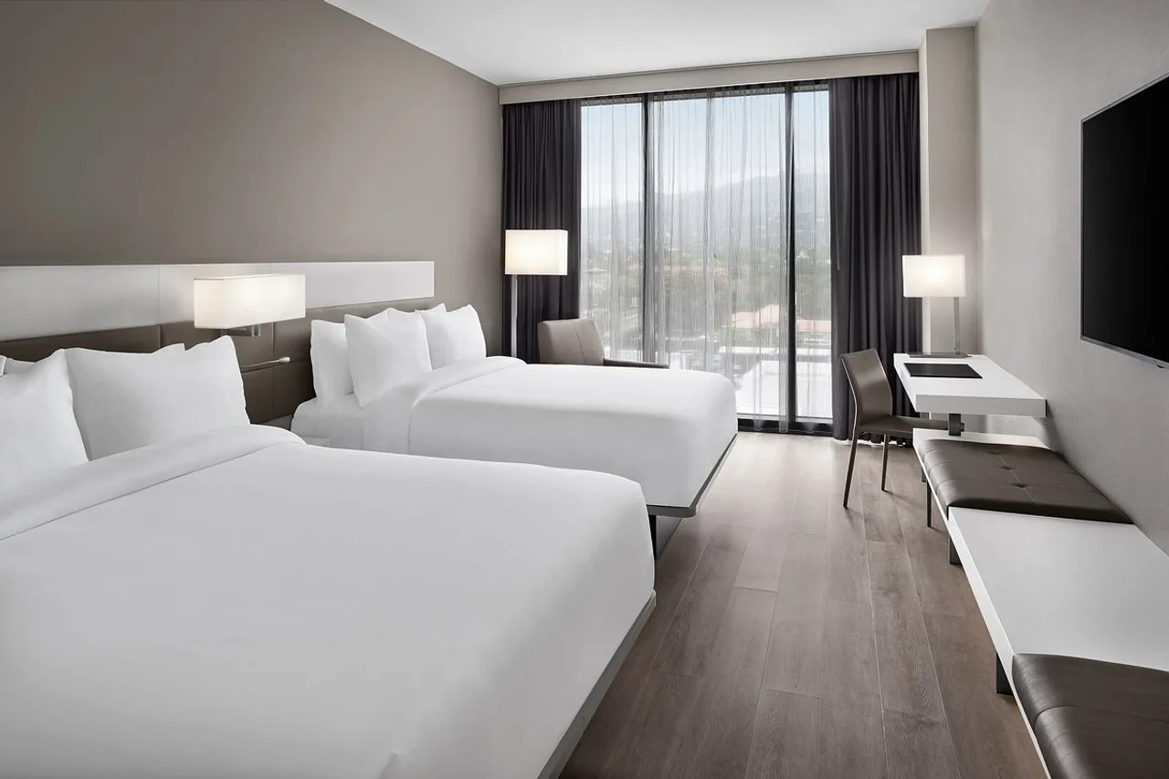 AC Hotel by Marriott Kingston, Jamaica — rooms and atmosphere
