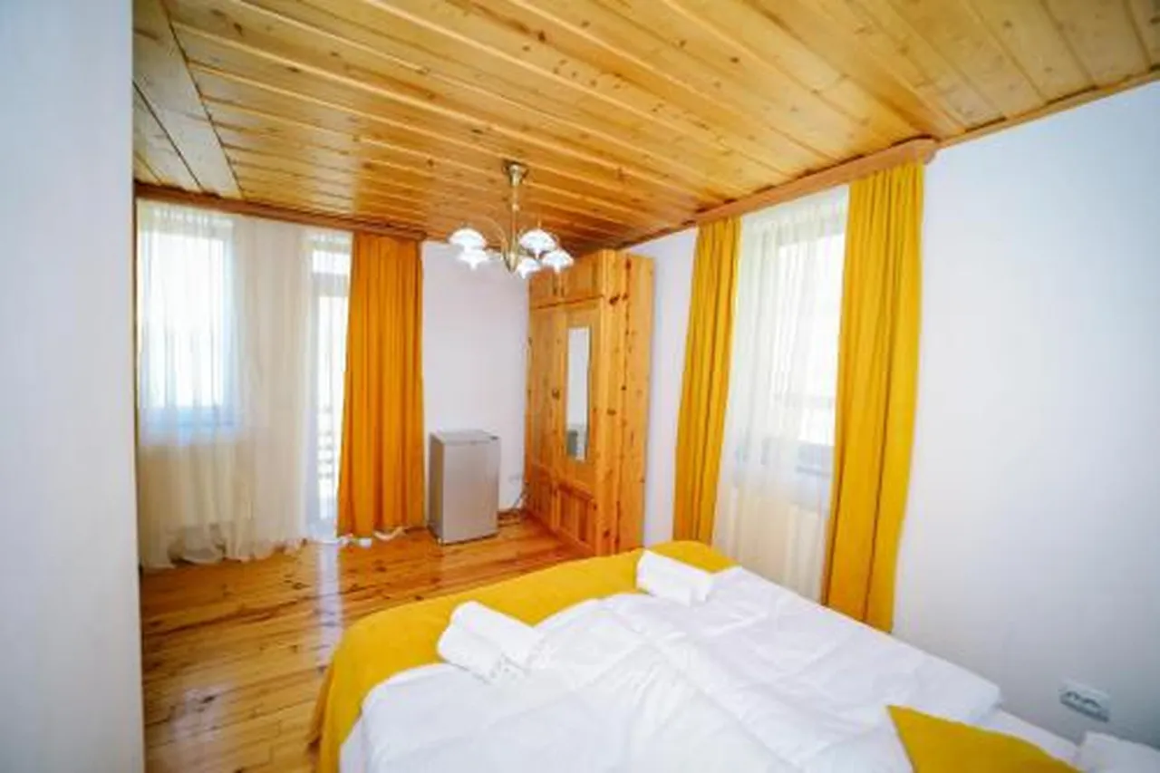 Alpenhaus Kazbegi Hotel & Restaurant — rooms and atmosphere