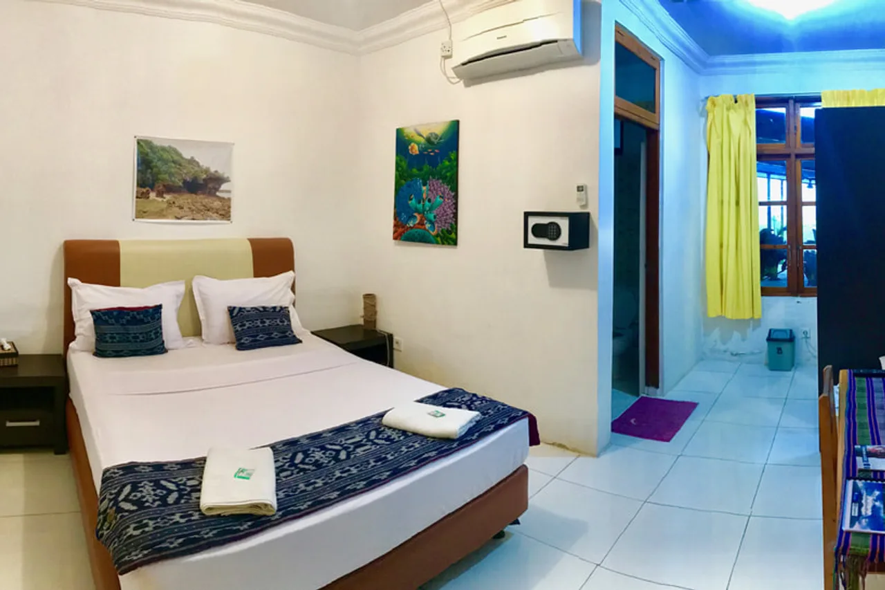 Beloi Beach Hotel Dive Resort — ภาพห้องพักและบรรยากาศ