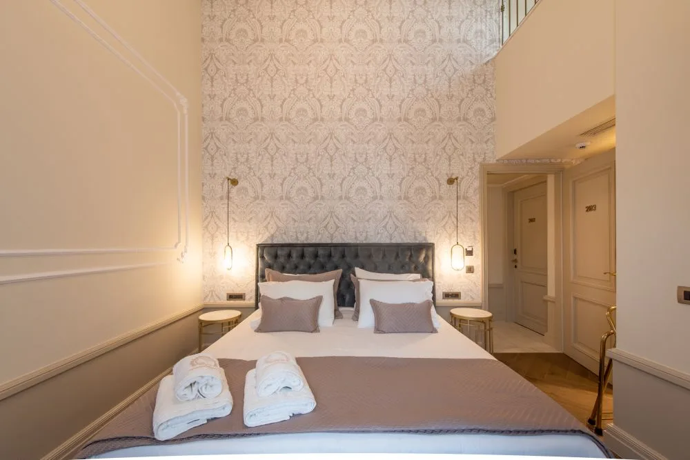 Capolavoro Suites — ภาพห้องพักและบรรยากาศ