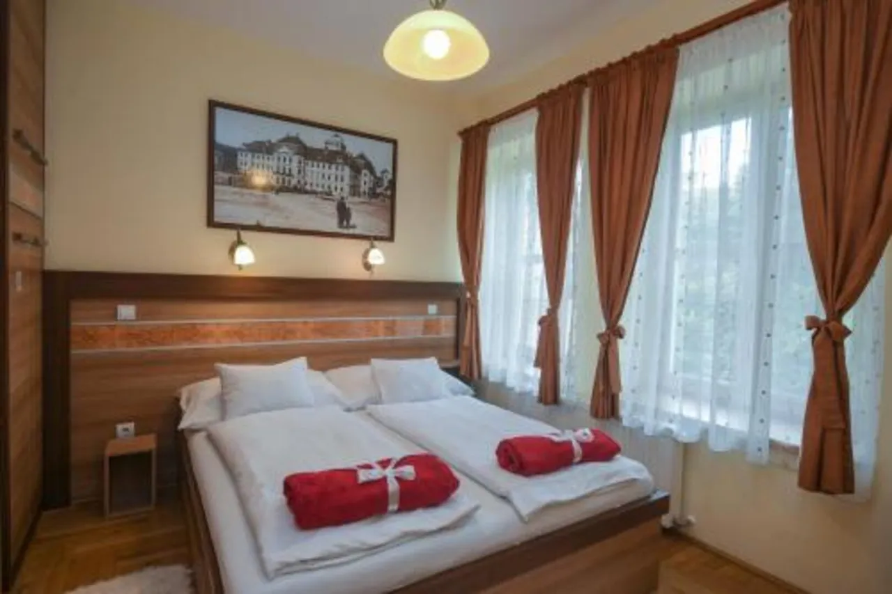 Centrum Vendégház — ภาพห้องพักและบรรยากาศ