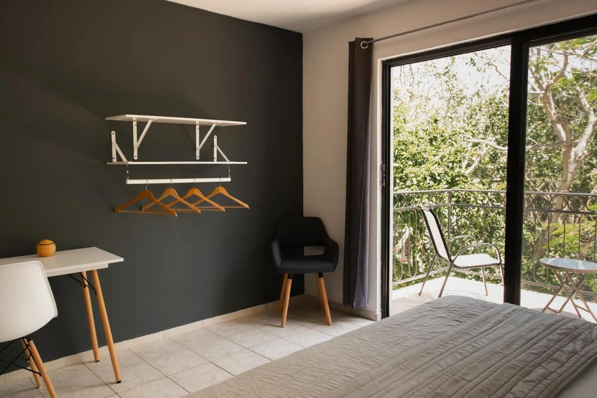Che Suites Playa — ภาพห้องพักและบรรยากาศ