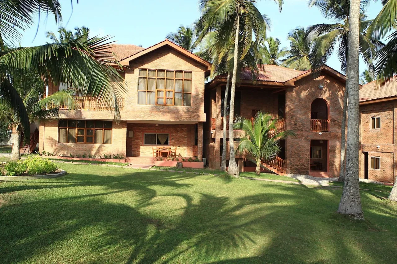 Coconut Grove Beach Resort — ภาพห้องพักและบรรยากาศ