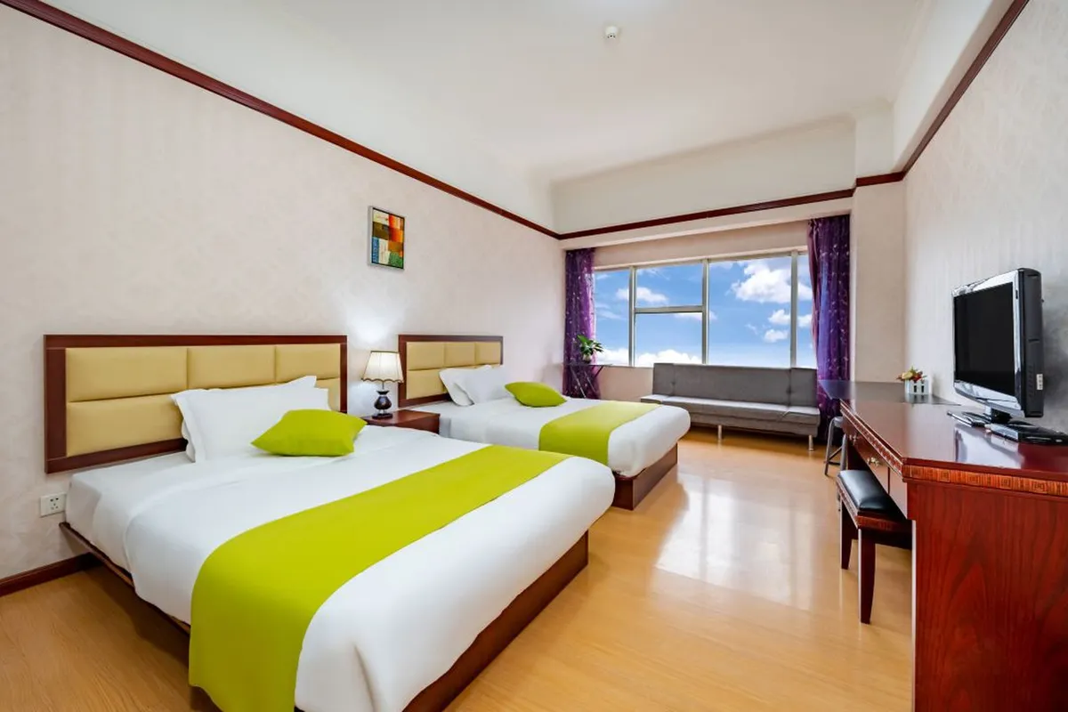 Da Zhen Hotel Kunming — rooms and atmosphere