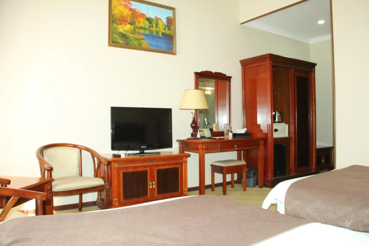 Firuz Hotel — ภาพห้องพักและบรรยากาศ