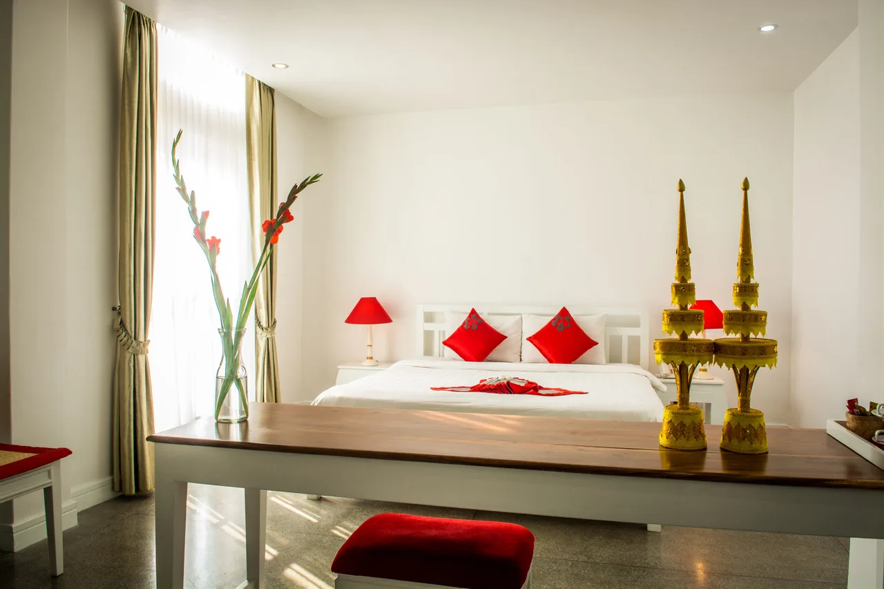The Frangipani Royal Palace Hotel — rooms and atmosphere