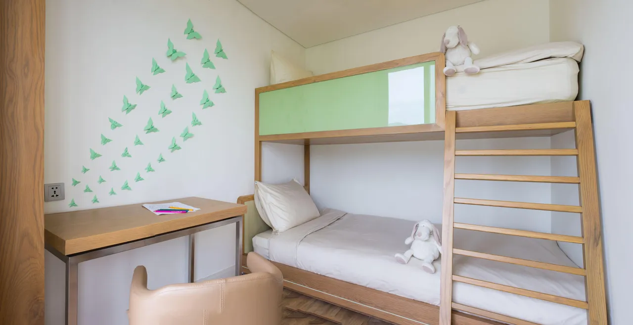 Fusion Suites Danang Beach — rooms and atmosphere