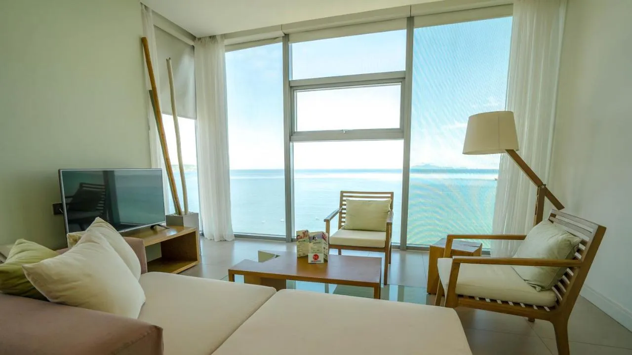 Fusion Suites Danang Beach — rooms and atmosphere