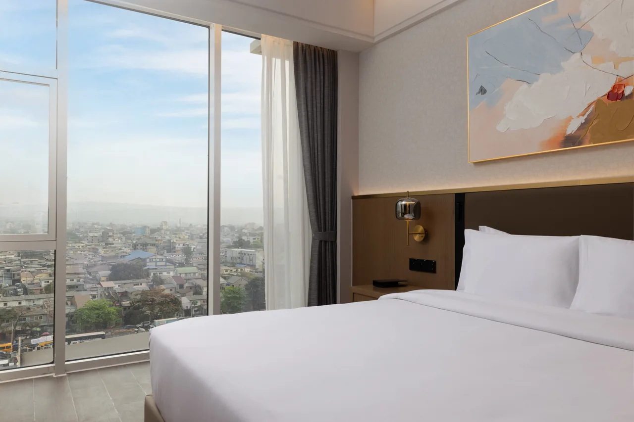 Golden Tulip Kin-Oasis Kinshasa — rooms and atmosphere
