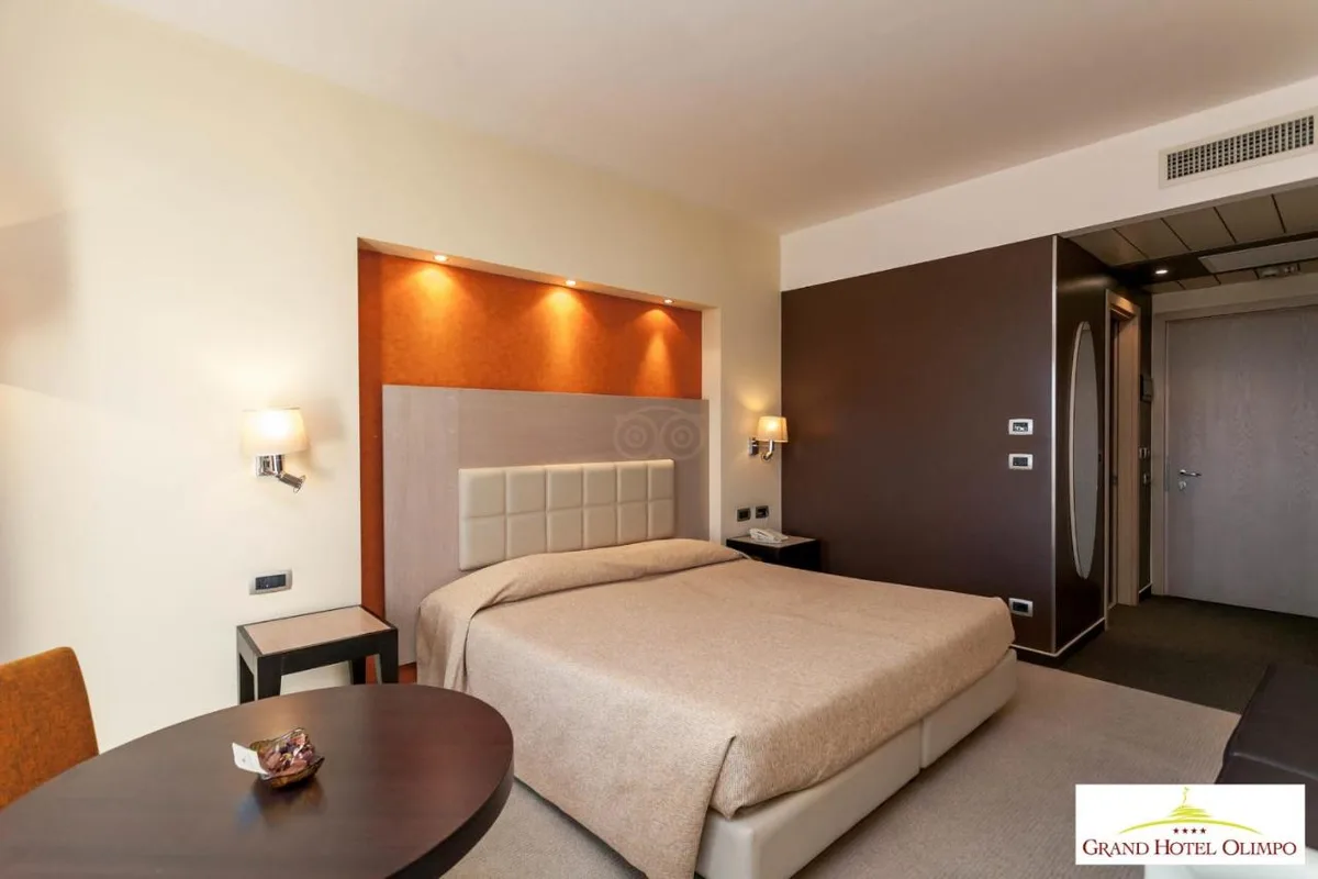 Grand Hotel Olimpo — ภาพห้องพักและบรรยากาศ