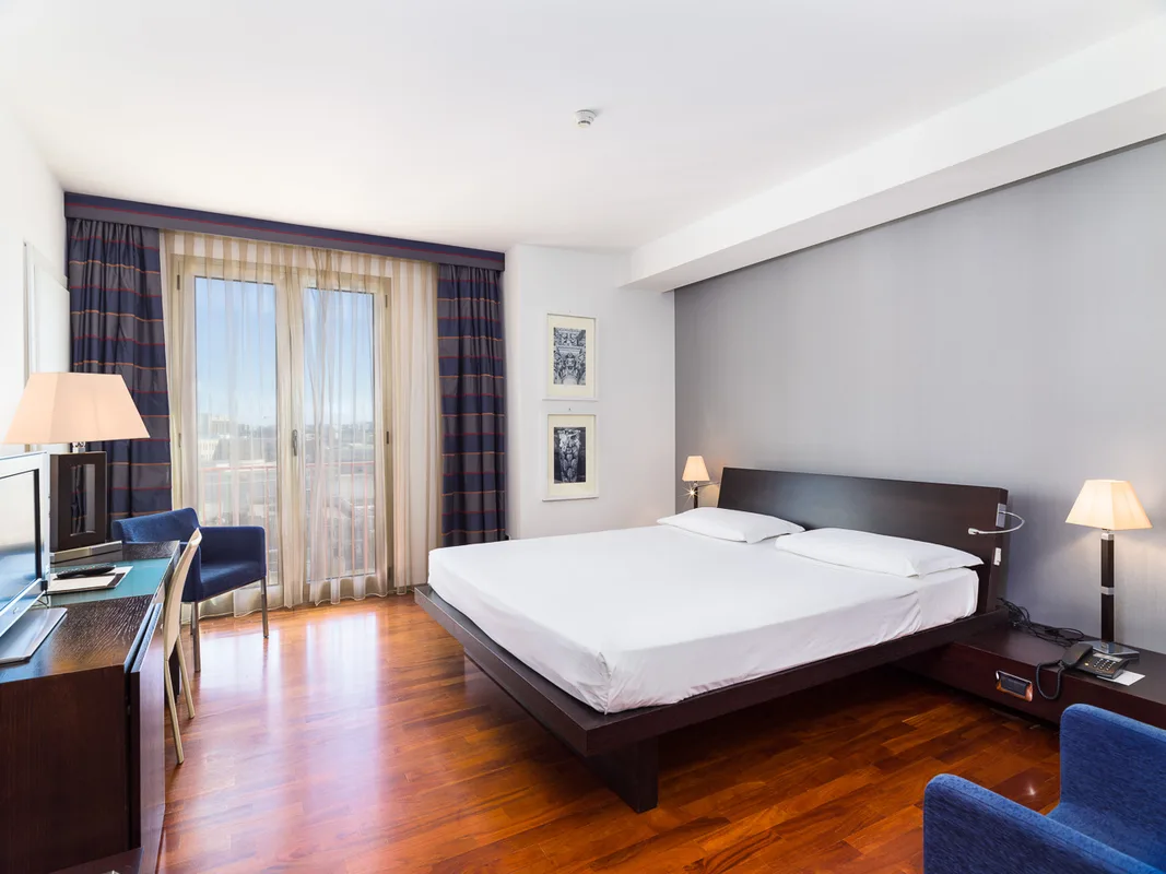 Grand Hotel Tiziano e dei Congressi — ภาพห้องพักและบรรยากาศ