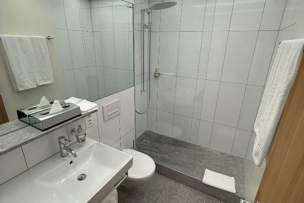 Hotel Hauser St. Moritz — rooms and atmosphere