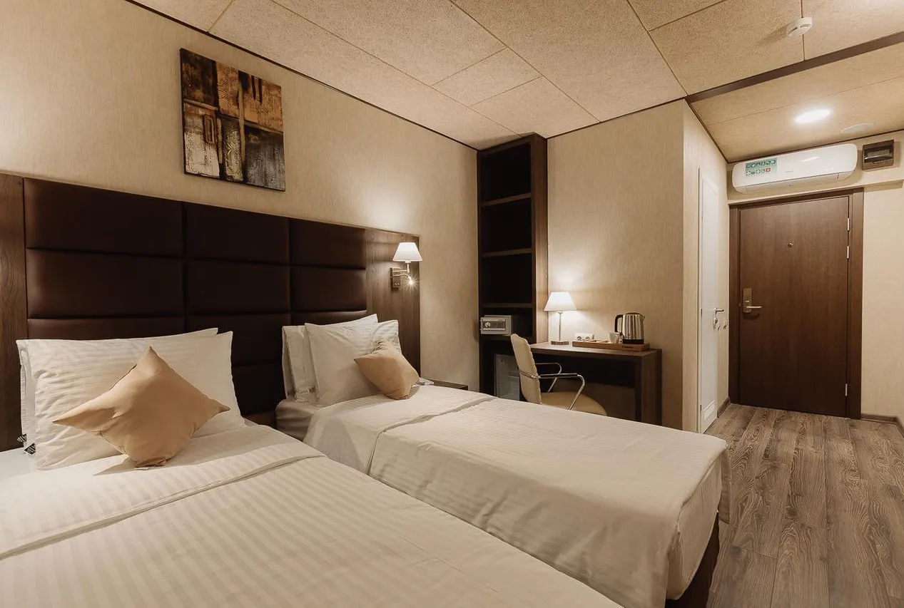 Helix Hotel — ภาพห้องพักและบรรยากาศ
