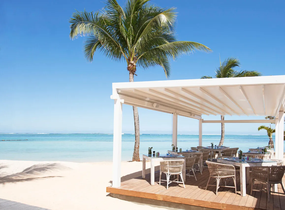 Heritage Le Telfair Golf & Wellness Resort — rooms and atmosphere