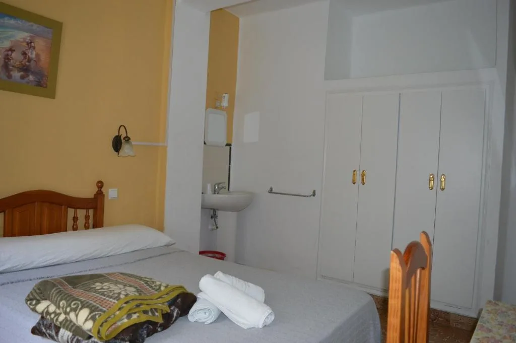 Hostal Doña Carmen — ภาพห้องพักและบรรยากาศ