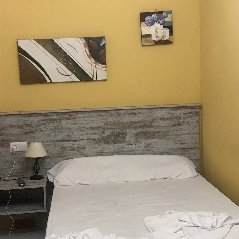 Hostal Virgen del Rocío — ภาพห้องพักและบรรยากาศ