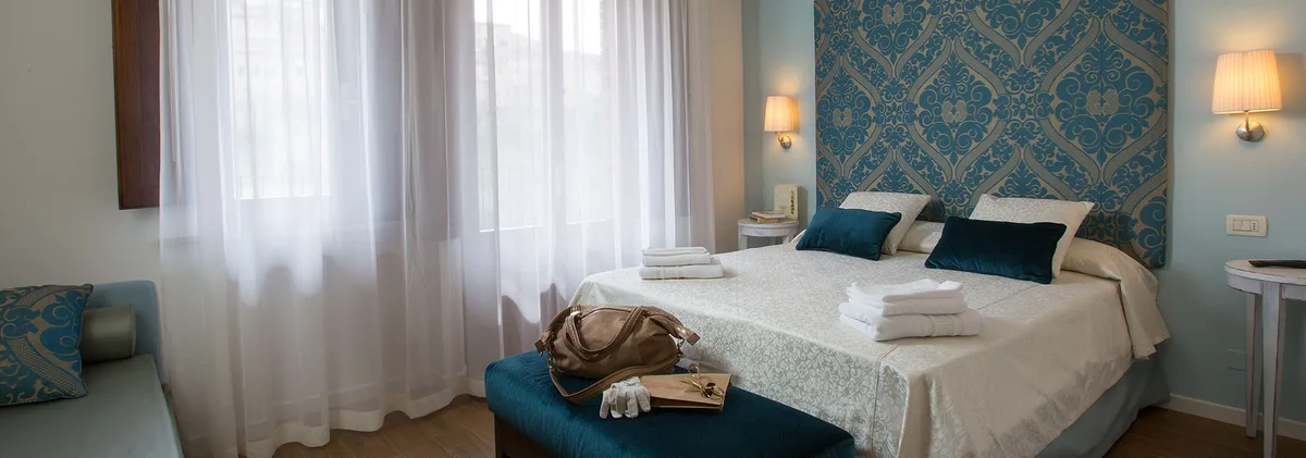 Hotel Alma Domus — ภาพห้องพักและบรรยากาศ