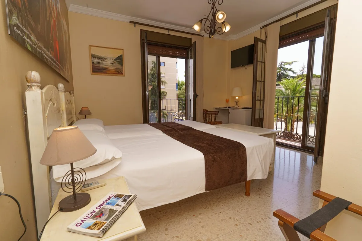 Hotel Colón — ภาพห้องพักและบรรยากาศ