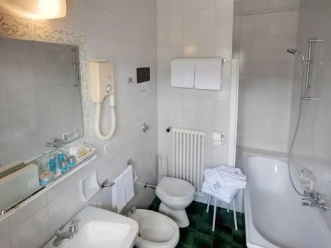 Hotel de la Poste Cortina — rooms and atmosphere