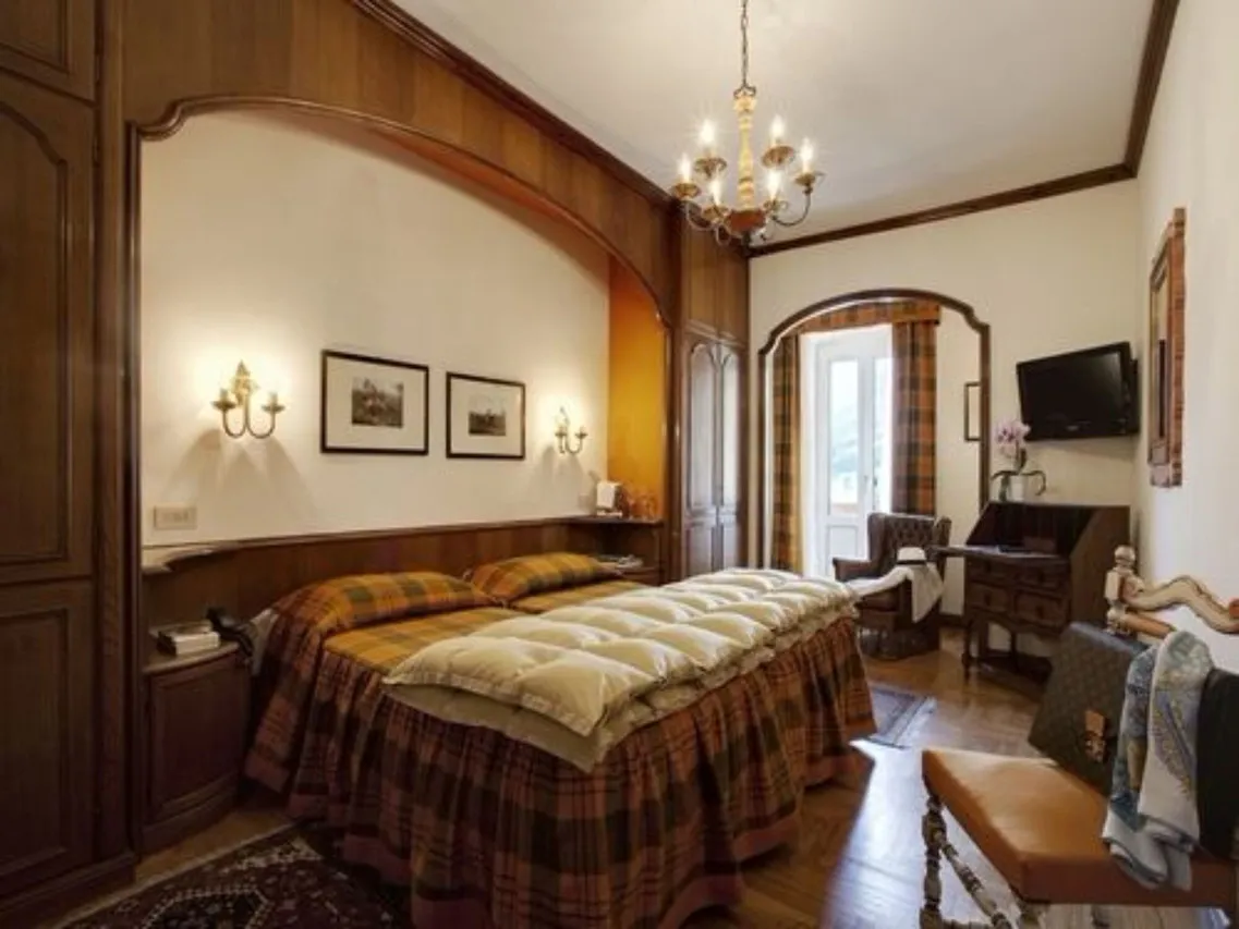 Hotel de la Poste Cortina — rooms and atmosphere