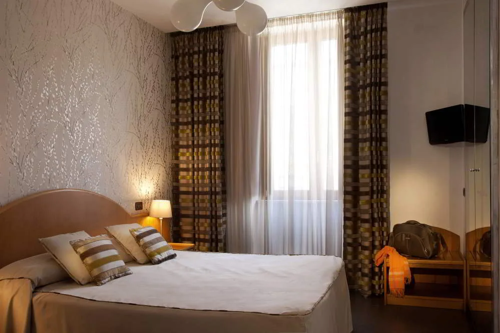 Hotel del Corso — ภาพห้องพักและบรรยากาศ