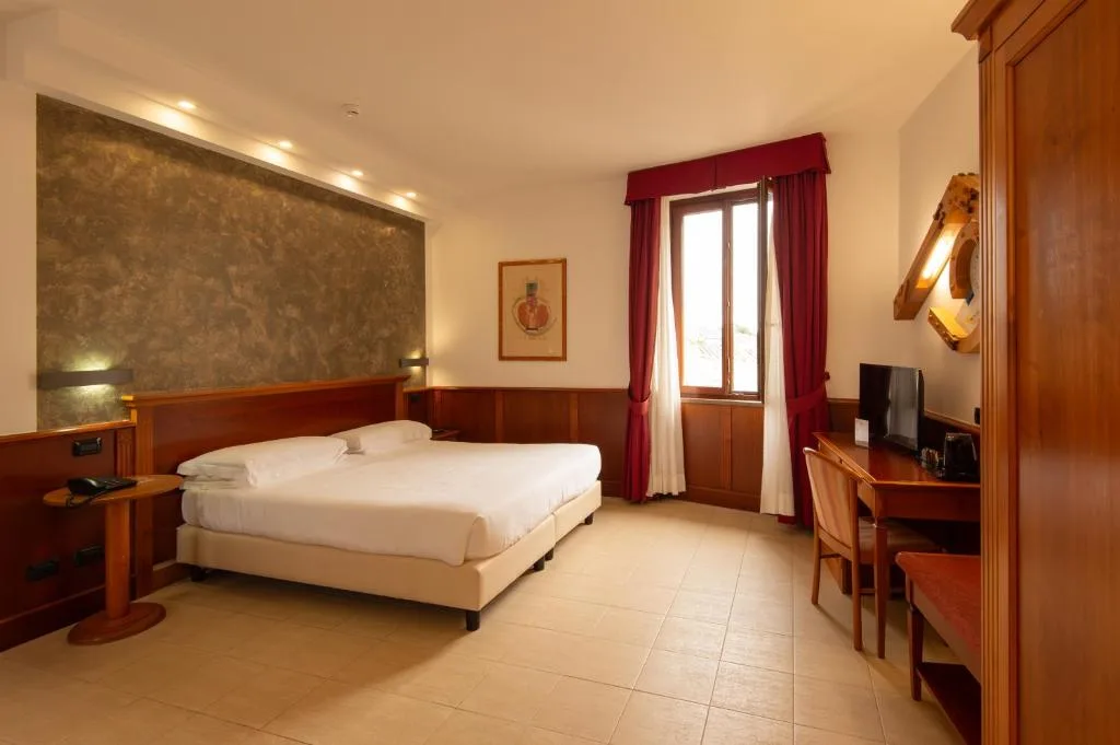 Hotel Duomo - Etruria Collection — ภาพห้องพักและบรรยากาศ