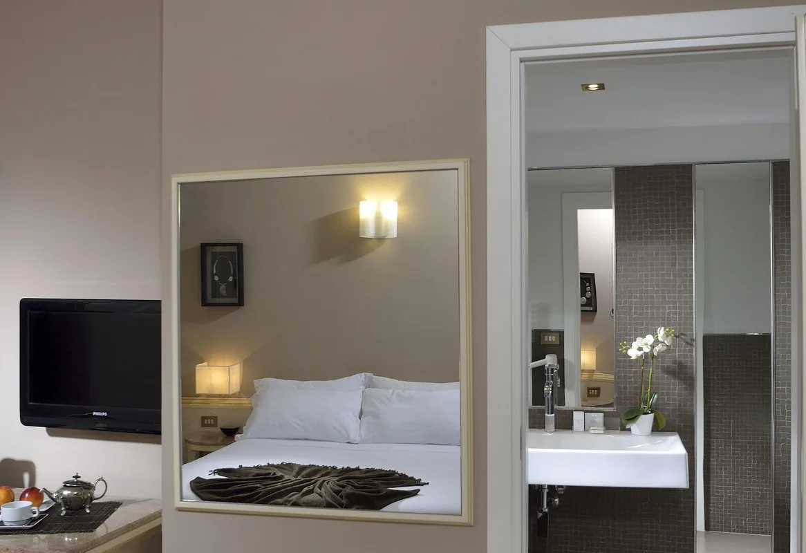 Hotel Metropolitan — ภาพห้องพักและบรรยากาศ