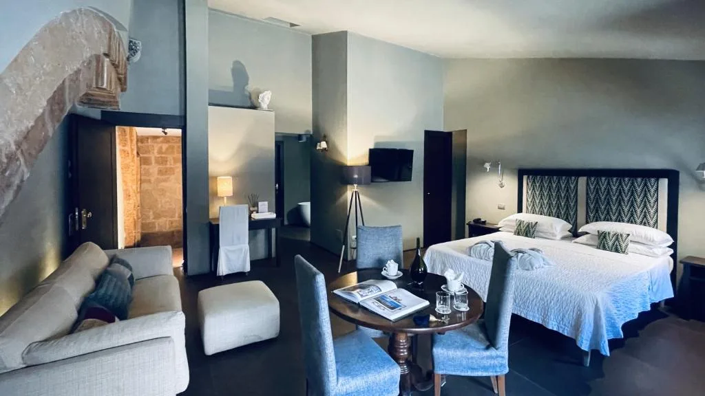 Hotel Palazzo Piccolomini — ภาพห้องพักและบรรยากาศ