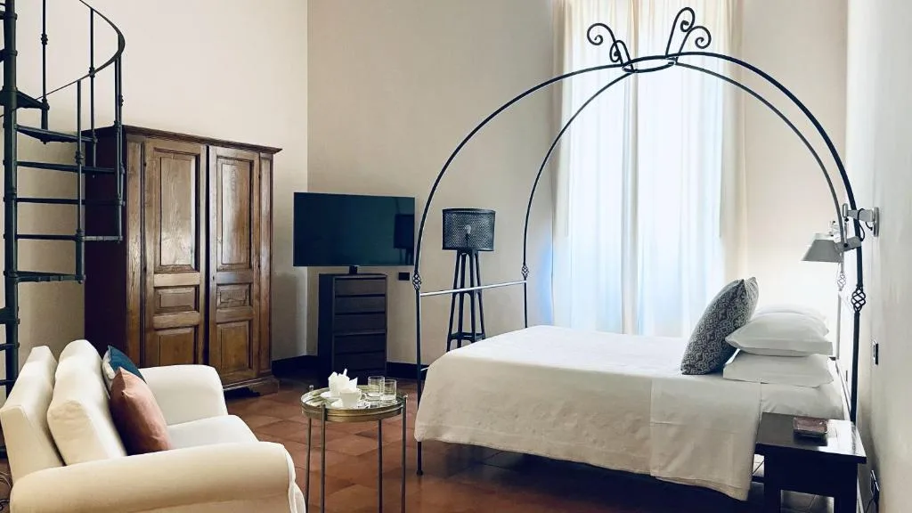 Hotel Palazzo Piccolomini — ภาพห้องพักและบรรยากาศ