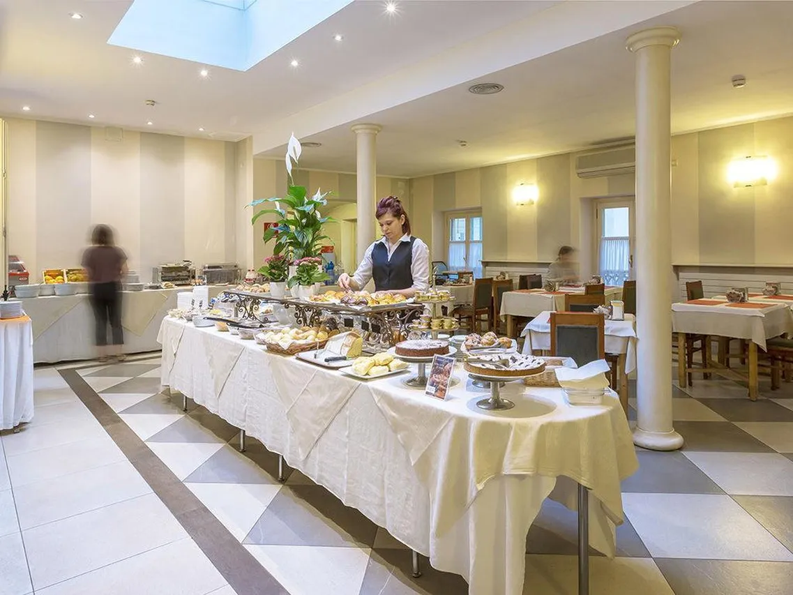 Hotel Roma e Rocca Cavour — rooms and atmosphere