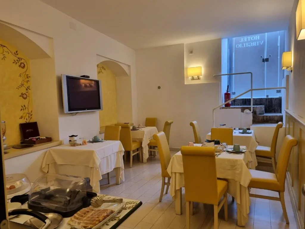 Hotel Virgilio — ภาพห้องพักและบรรยากาศ