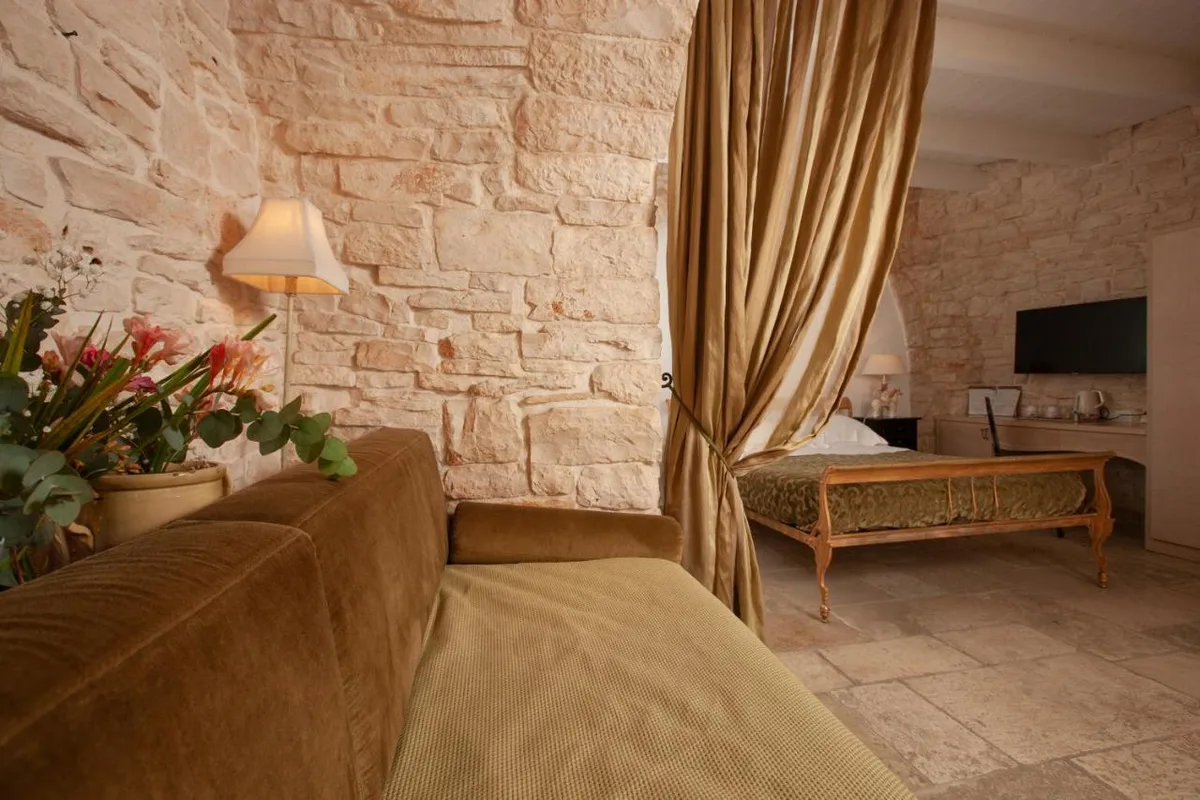 Le Alcove - Luxury Hotel nei Trulli — ภาพห้องพักและบรรยากาศ