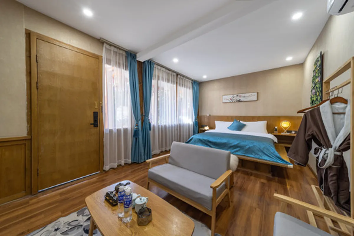 Lijiang Sunshine Nali Inn — rooms and atmosphere