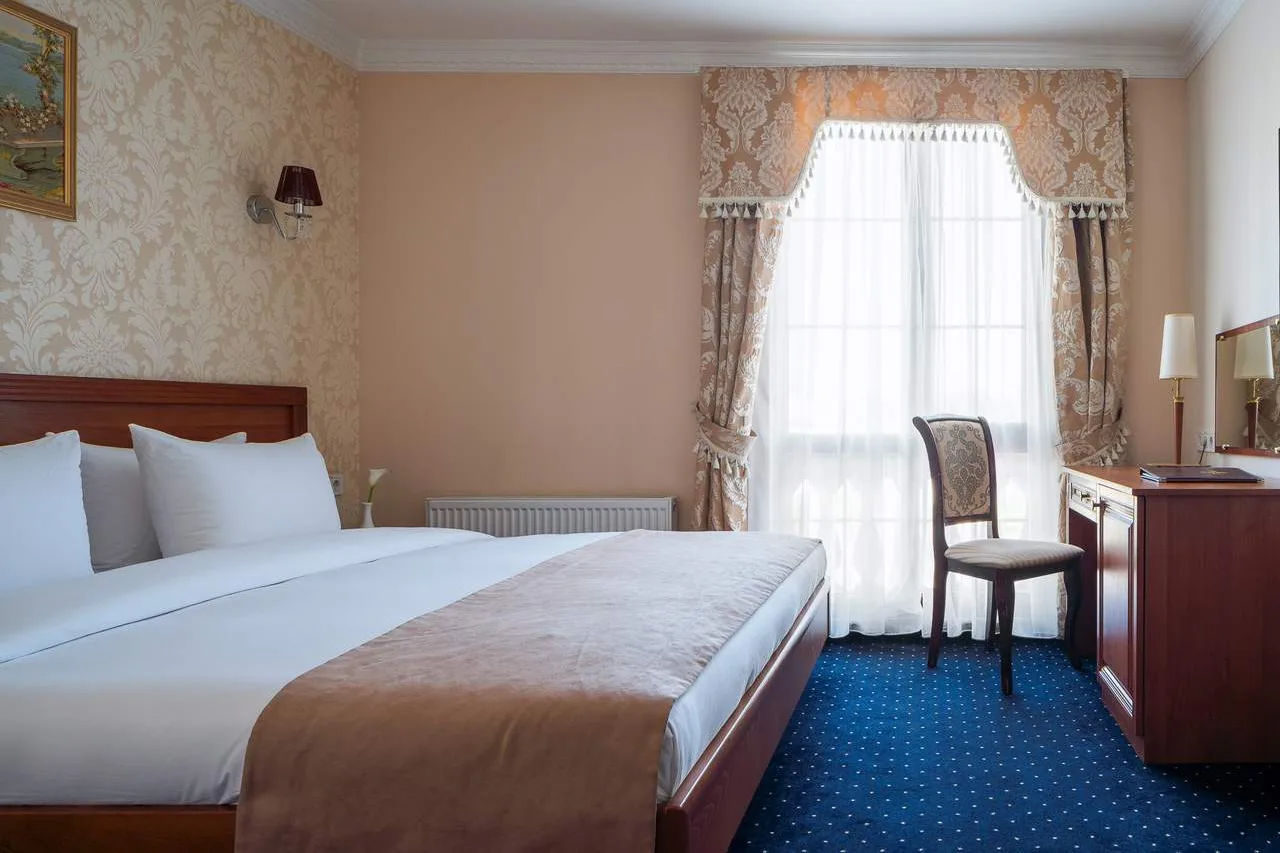 Mozart Hotel — ภาพห้องพักและบรรยากาศ