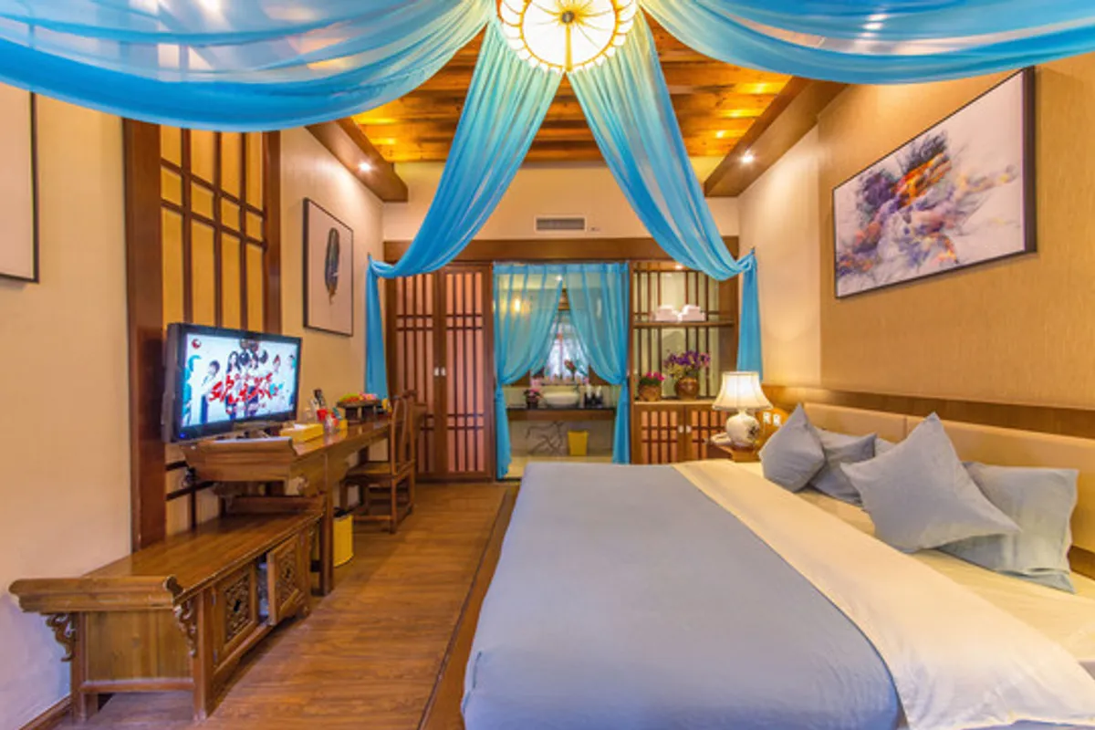 Mu Shi Yuan Inn Lijiang — rooms and atmosphere