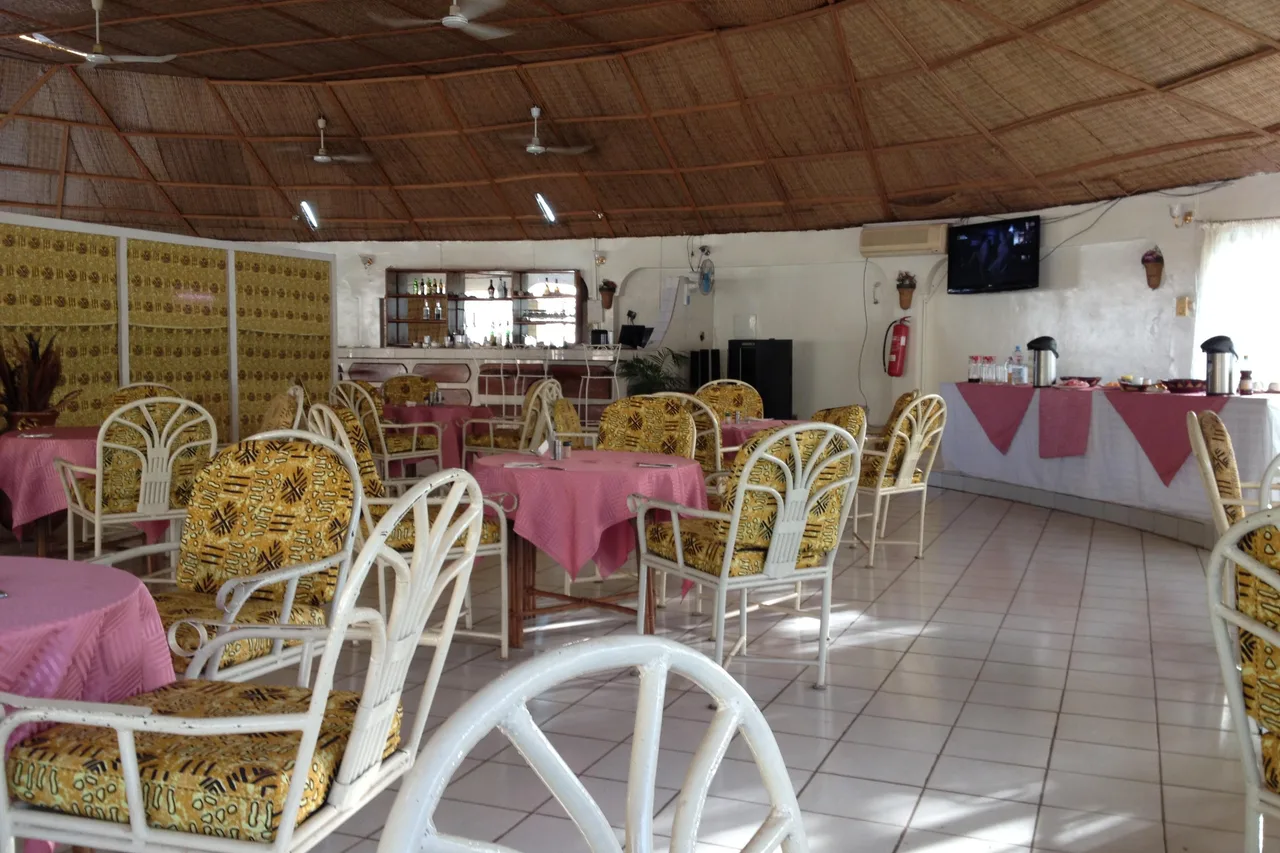Olympe International Hotel — rooms and atmosphere