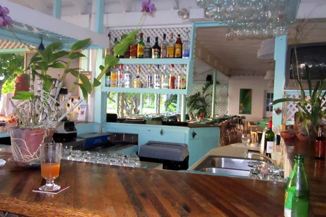 Oualie Beach Resort — ภาพห้องพักและบรรยากาศ
