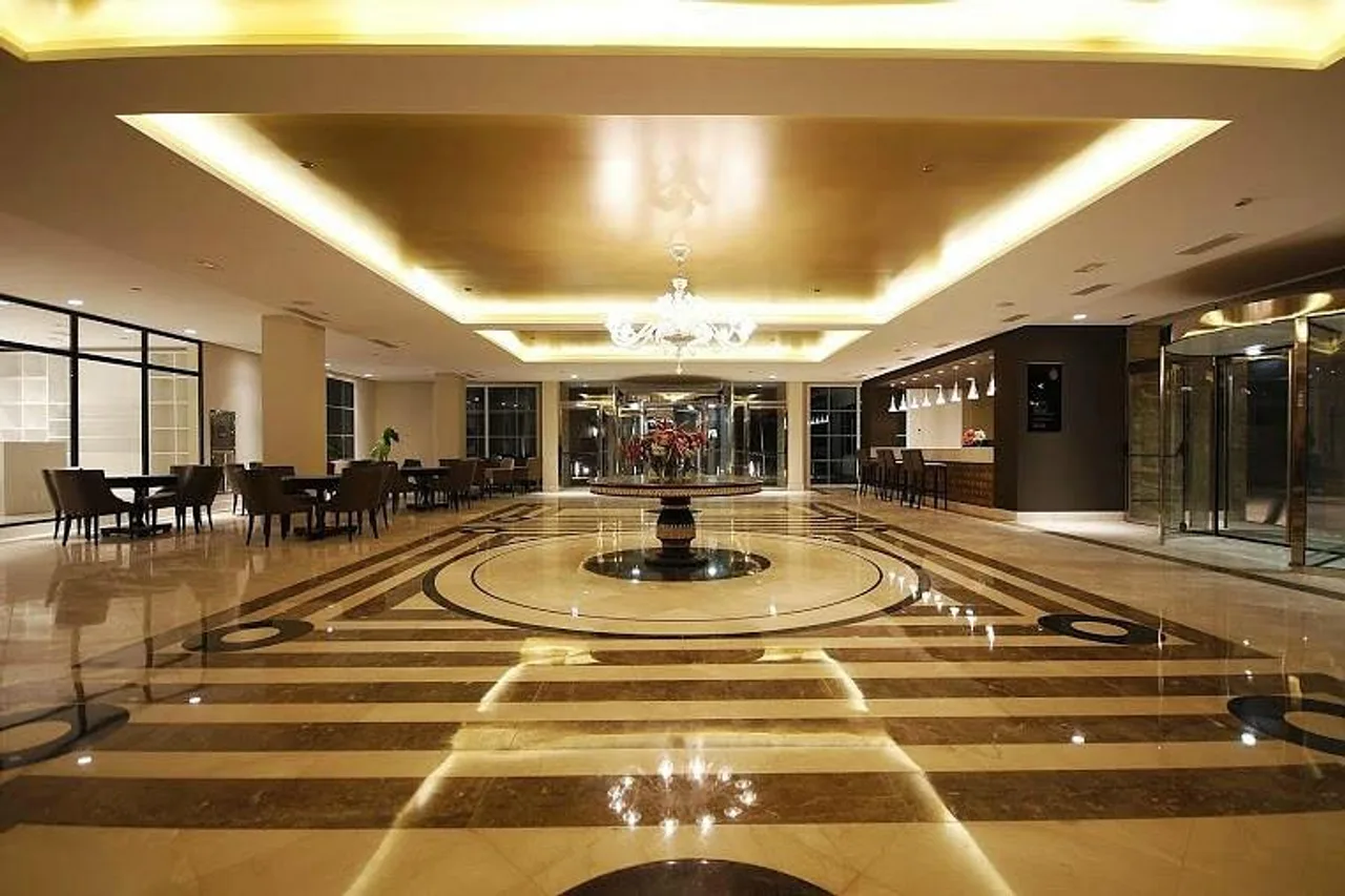 Palm Camayenne — rooms and atmosphere