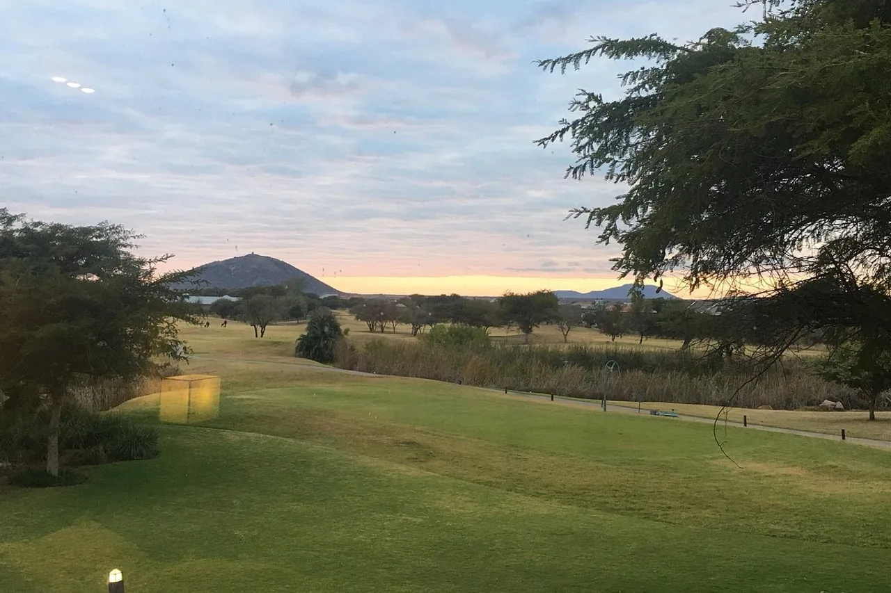 Phakalane Golf Estate Hotel Resort — rooms and atmosphere