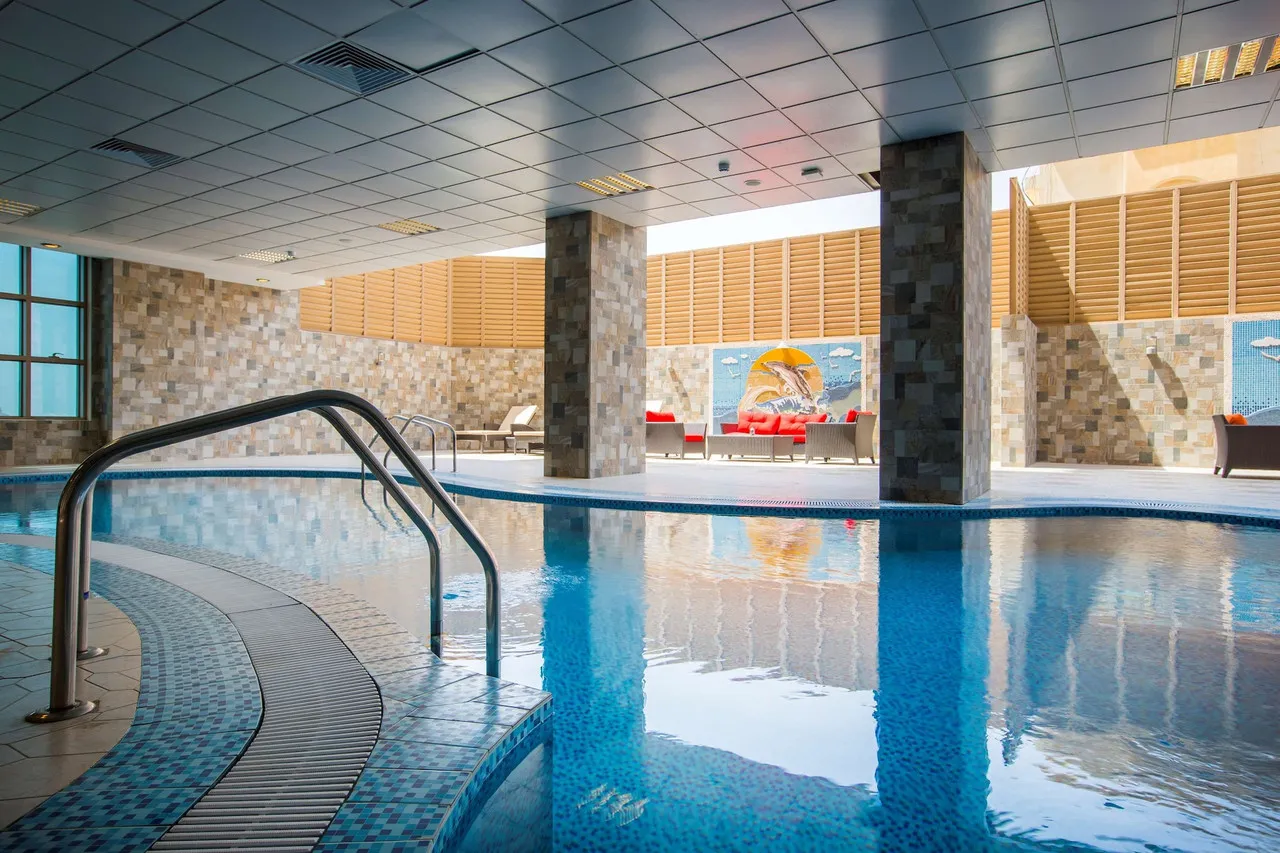 Radisson Blu Plaza Jeddah — rooms and atmosphere