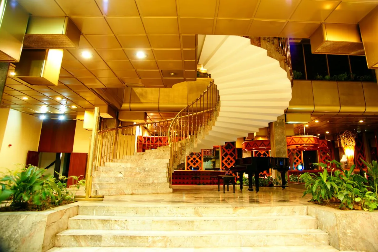 Rainbow Towers Hotel and Conference Centre — rooms and atmosphere